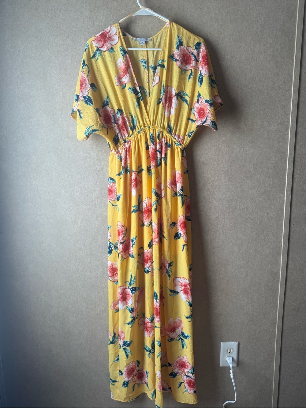 Yellow women's top with label